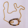 Sautoir doré pendentif effet corne asymétrique x AFRICA