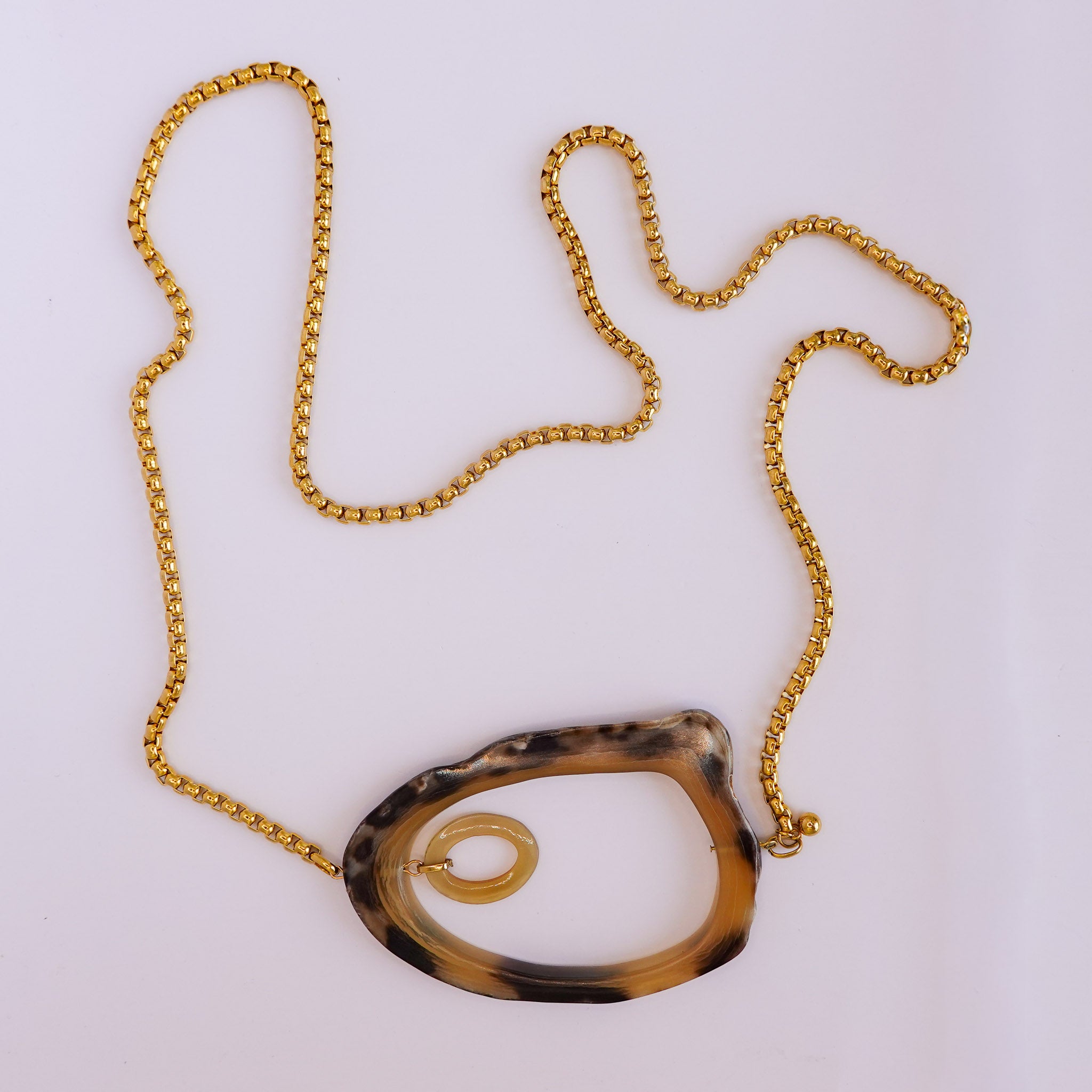 Sautoir doré pendentif effet corne asymétrique x AFRICA