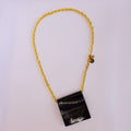 Collier doré pendentif carré effet corne noir profond x AFRICA