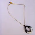 Collier doré pendentif goutte effet corne x AFRICA